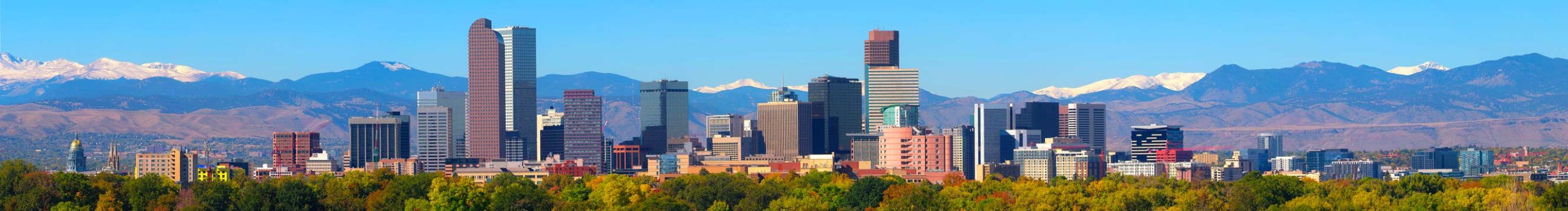 Denver Skyline with the rocky mountains in the background