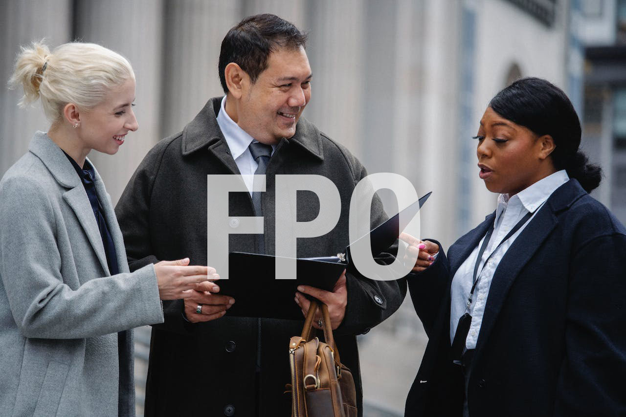 pexels-proffessionals Group of leaders of diverse background conversing.