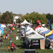 Image of tents, vendors, and people enjoying Thorntonfest
