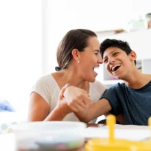 Smiling woman young man with disabilities enjoying time together